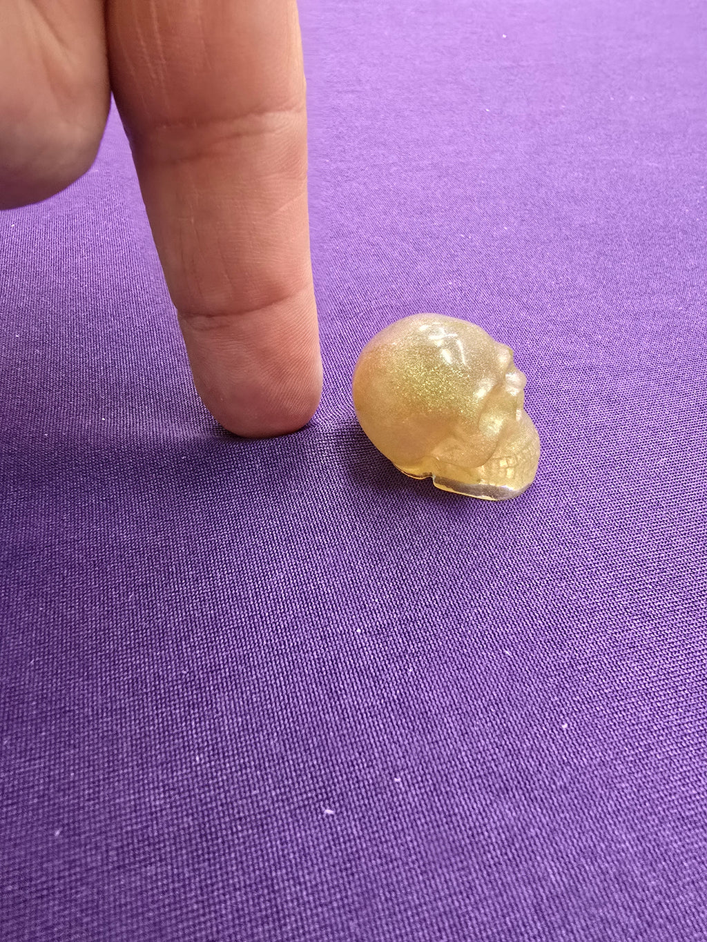 Skull-charm sized
