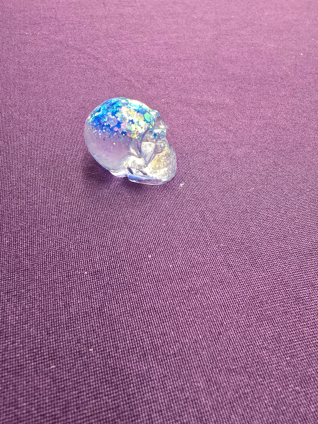 Skull-charm sized