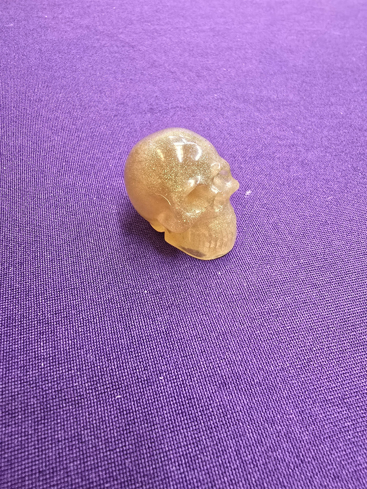 Skull-charm sized
