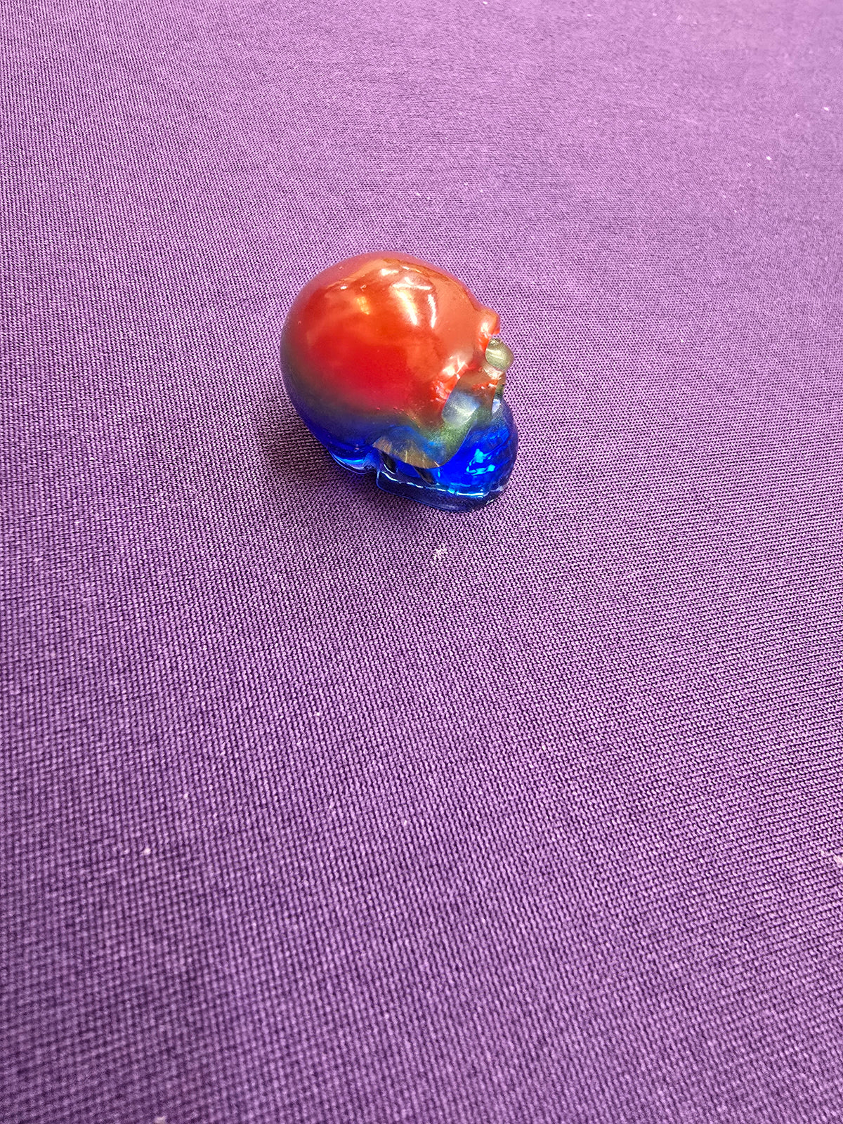 Skull-charm sized