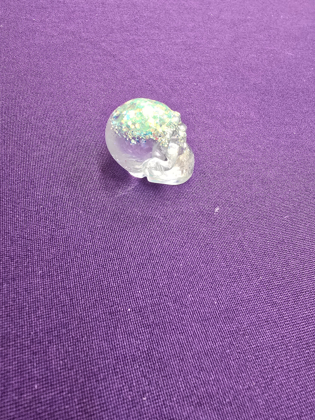 Skull-charm sized