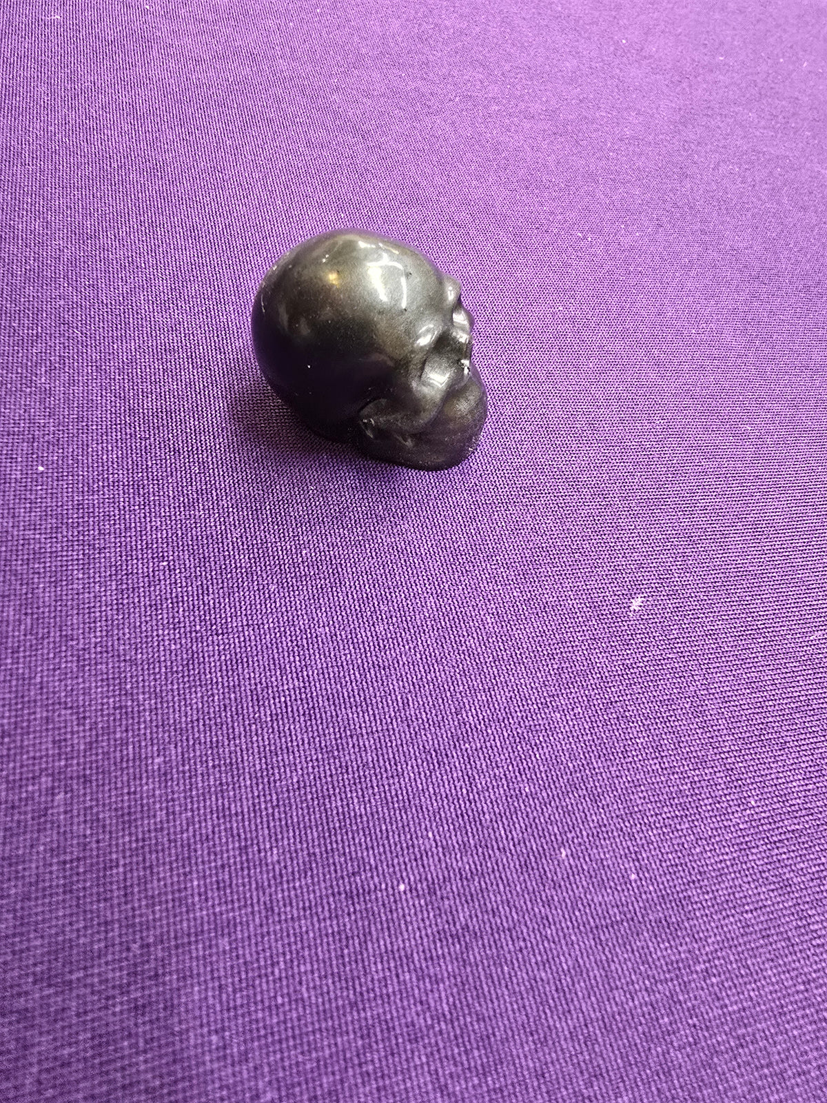 Skull-charm sized