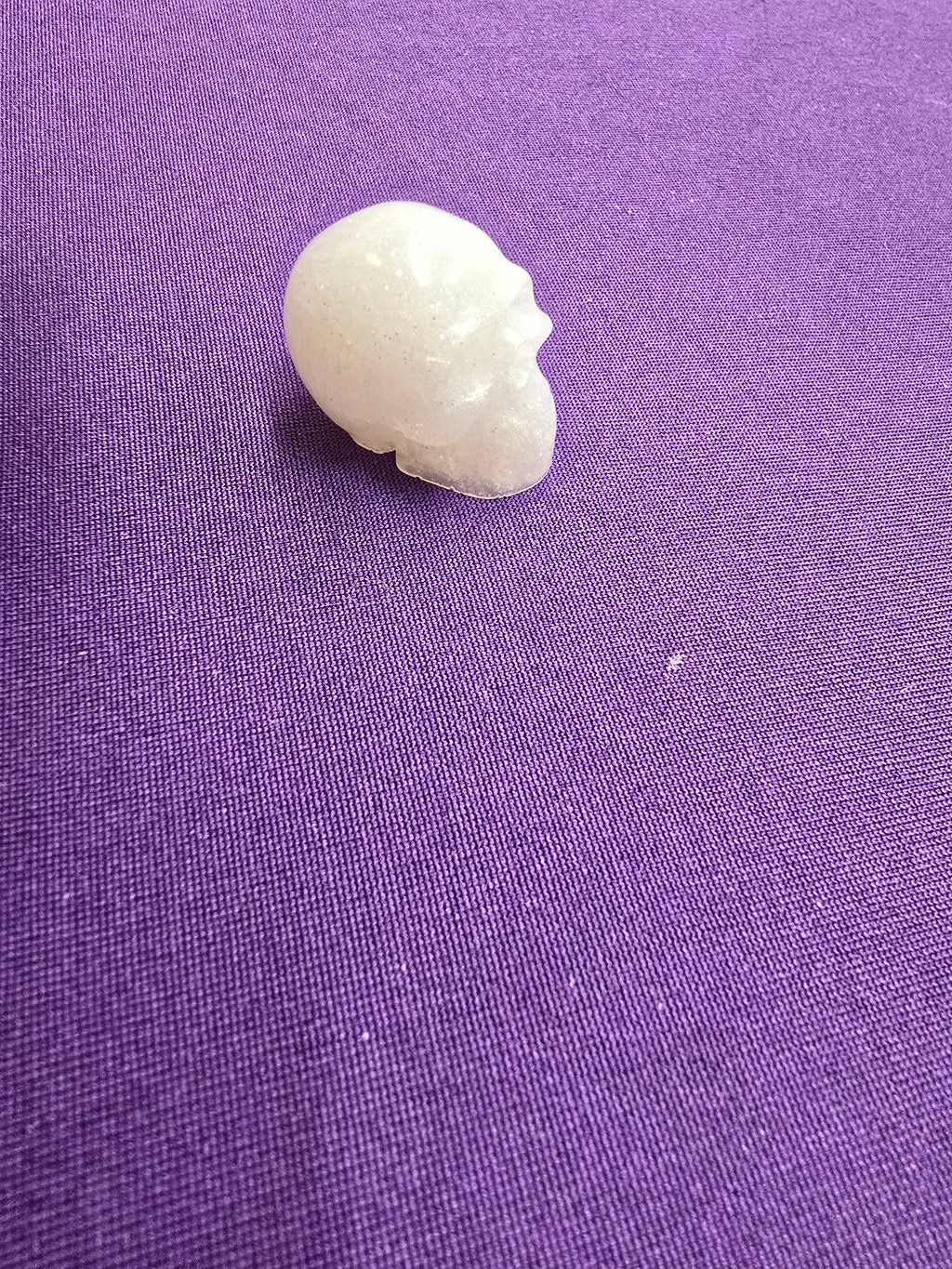 Skull-charm sized