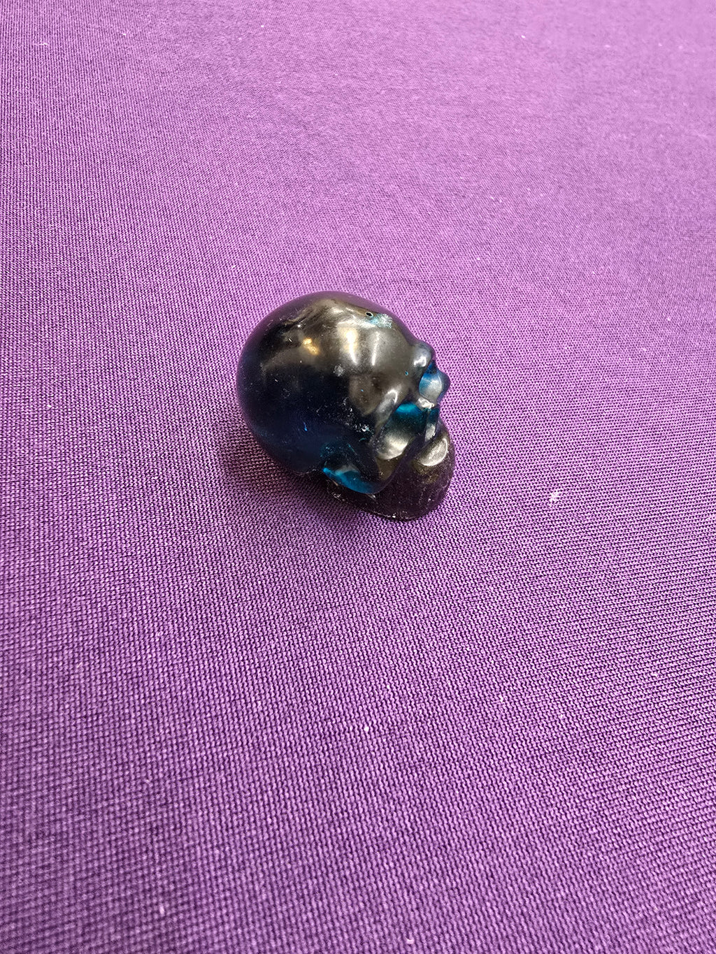 Skull-charm sized