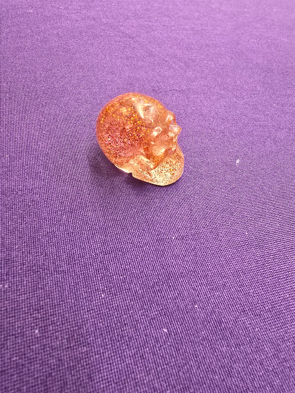 Skull-charm sized