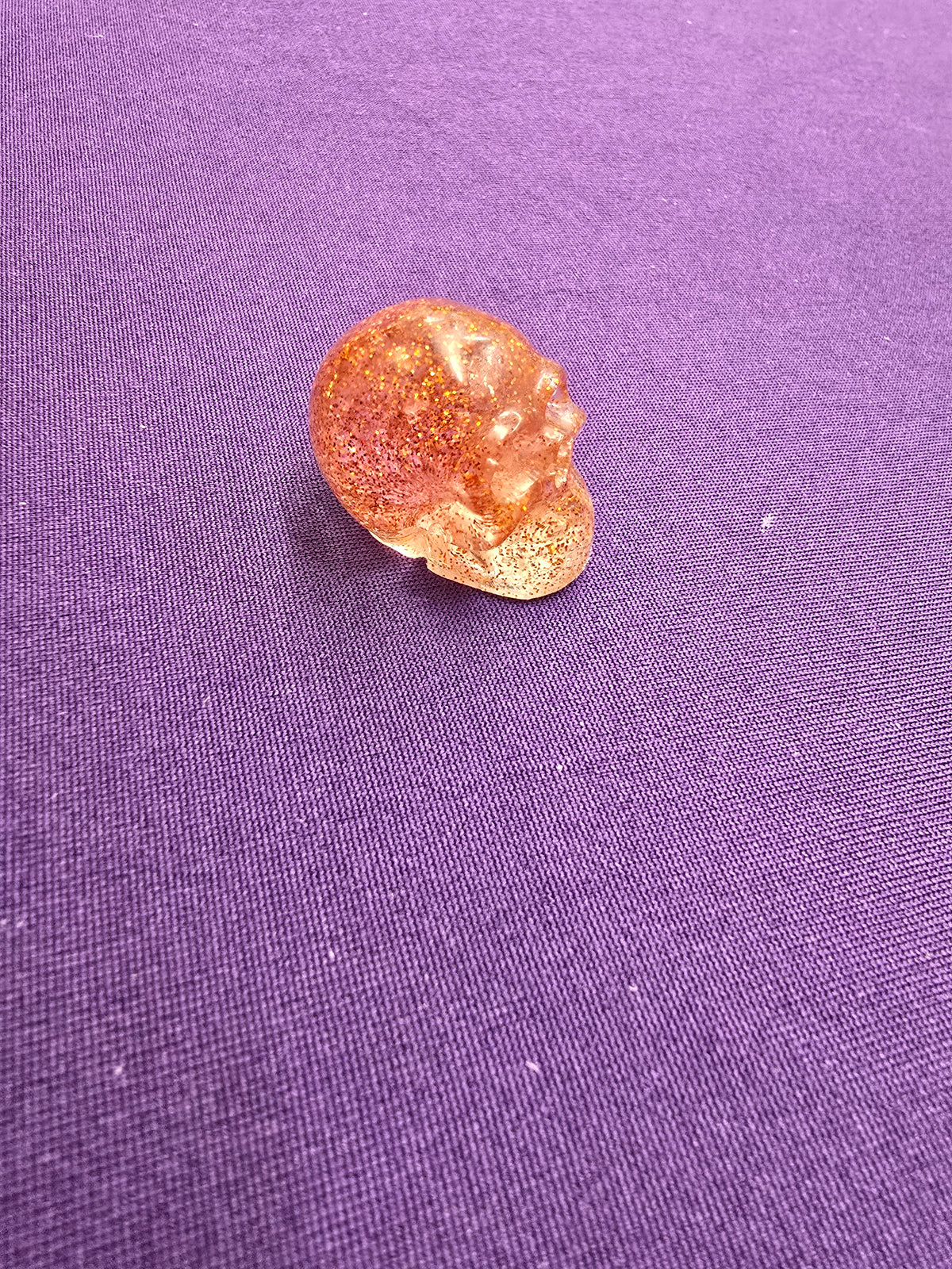 Skull-charm sized
