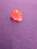 Skull-charm sized