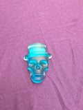 A translucent blue skull with a top hat.